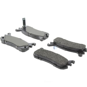 Centric Posi Quiet™ Extended Wear Semi-Metallic Rear Disc Brake Pads for 2002 Ford Escort - 106.06360